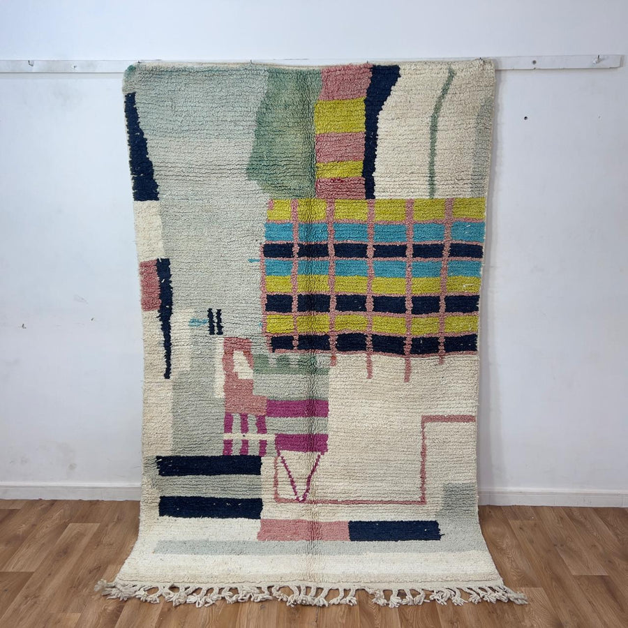 Vintage Moroccan wool rug 8.53x5.68 ft, handmade Berber shag carpet with colorful geometric tribal patterns in brown, pink, blue and mustard tones