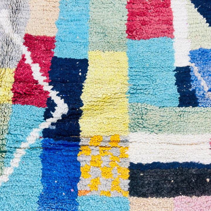 Vintage Moroccan wool rug with colorful patchwork Berber geometric design in pastel tones, handmade in Morocco