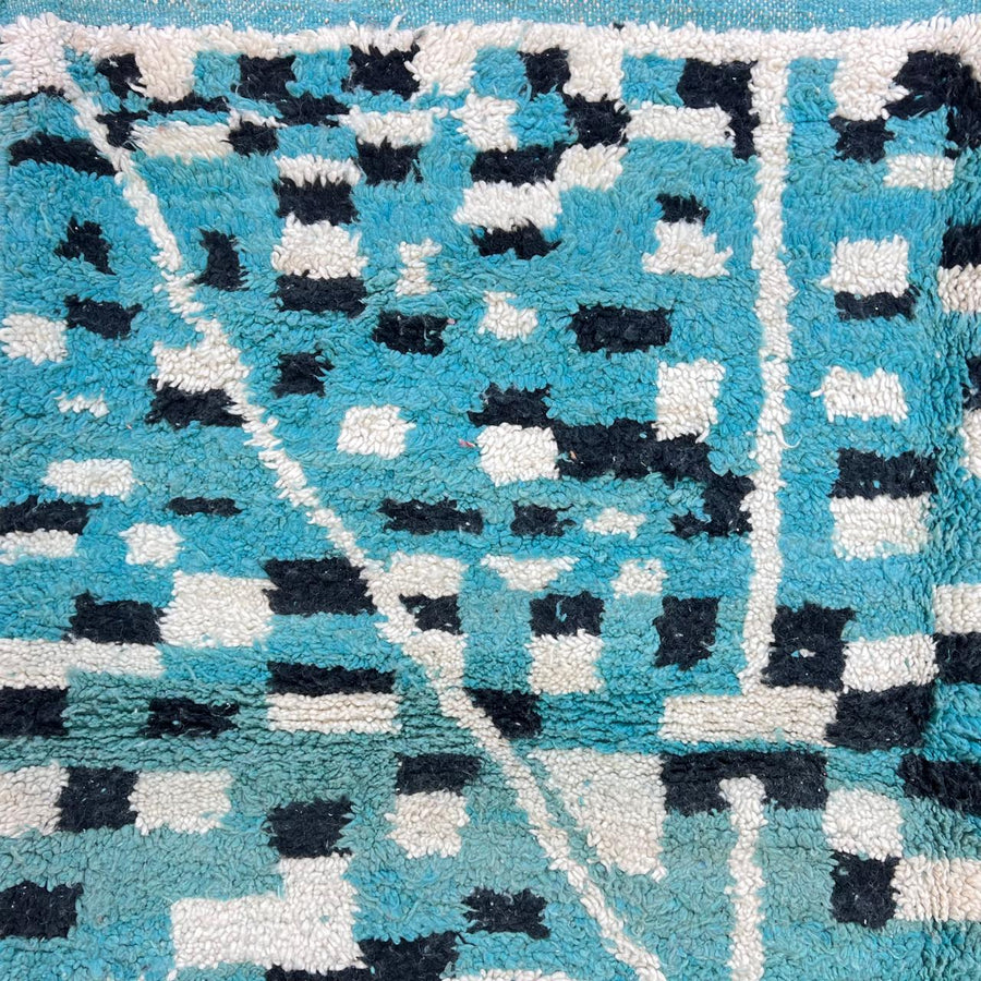 Vintage Moroccan wool rug in turquoise blue with black and ivory Berber geometric patterns