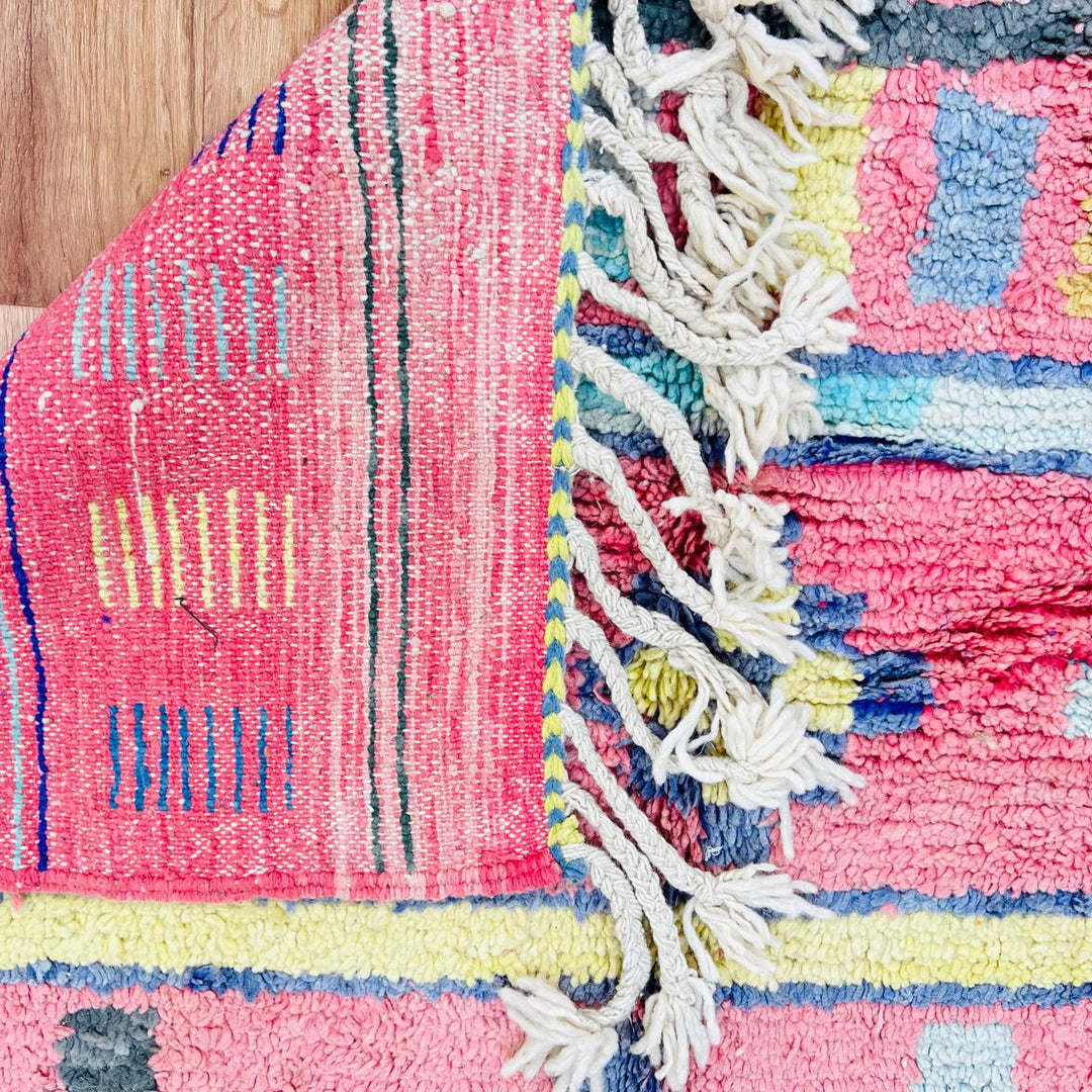 Vintage Moroccan wool rug with colorful Berber geometric patterns, handmade in Morocco