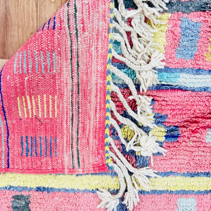 Vintage Moroccan wool rug with colorful Berber geometric patterns, handmade in Morocco