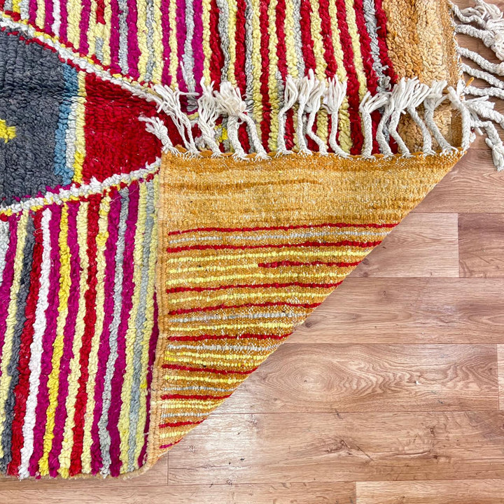 Vintage Moroccan wool rug with red, yellow, grey and ivory stripes and central diamond motif, handwoven Berber rug 235x152 cm