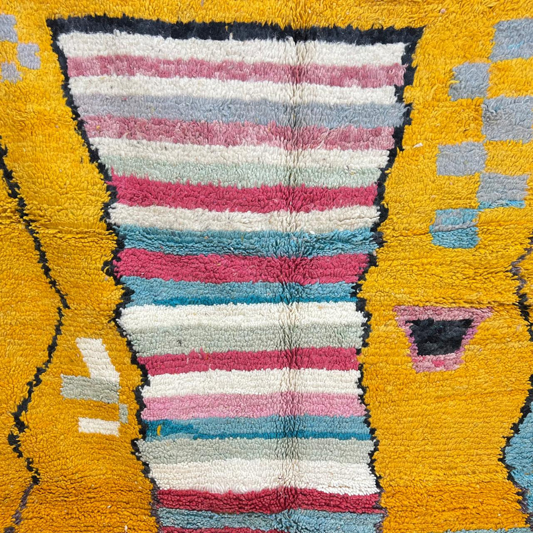 Vintage Moroccan wool rug with mustard yellow background and central striped pastel panel, abstract geometric Berber carpet 265x153 cm