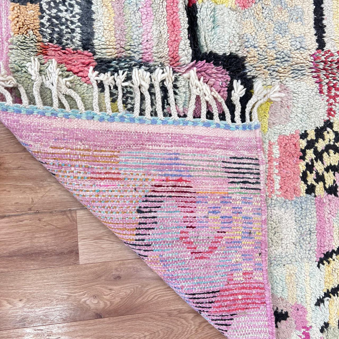 Vintage Moroccan wool rug with colorful patchwork Berber patterns, handmade in Morocco