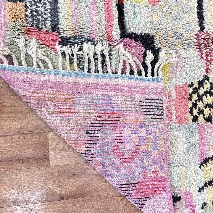 Vintage Moroccan wool rug with colorful patchwork Berber patterns, handmade in Morocco