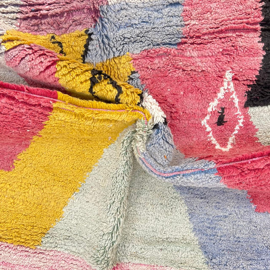 Vintage Moroccan wool rug with abstract Berber pattern in pink, yellow and blue