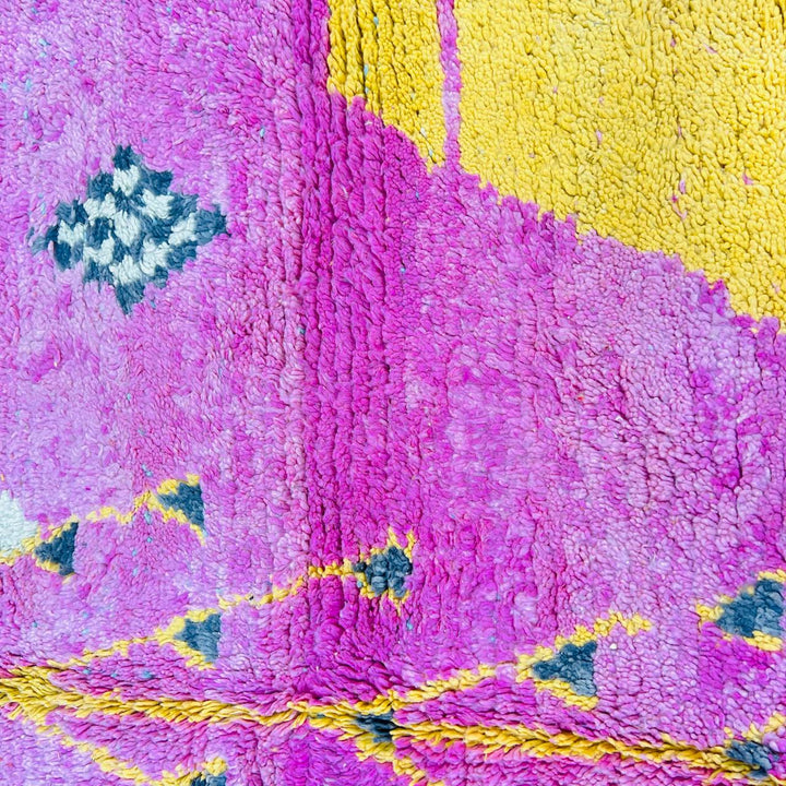 Vintage Moroccan wool rug with colorful Berber geometric and symbolic pattern, handmade in Morocco