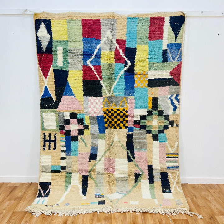 Vintage Moroccan wool rug with colorful patchwork Berber geometric design in pastel tones, handmade in Morocco