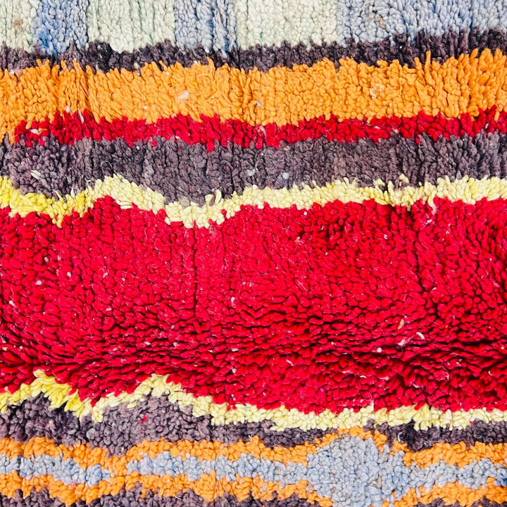 Vintage Moroccan wool rug 267x150 cm with abstract vertical design in blue, yellow, red and sage green – handmade Berber carpet from Morocco
