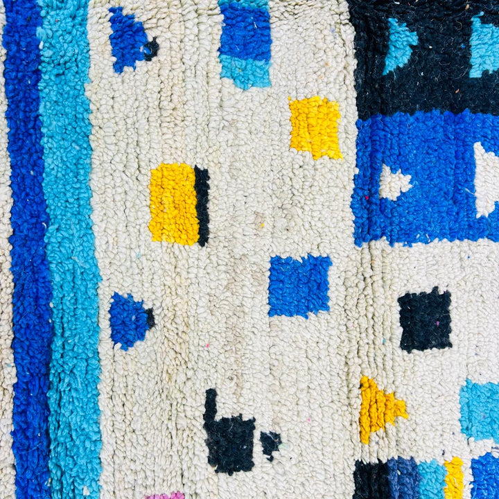 Vintage Moroccan wool rug with colorful geometric Berber pattern, handmade in Morocco