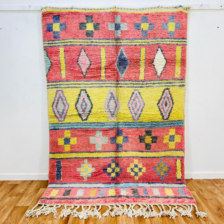 Vintage Moroccan wool rug with colorful Berber geometric patterns, handmade in Morocco