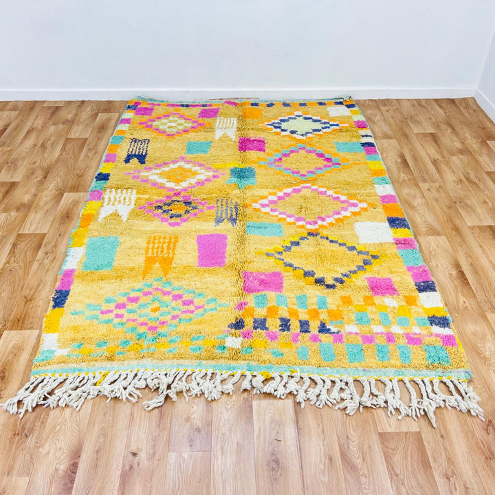 Vintage Moroccan wool rug with mustard yellow base and colorful Berber diamond patterns, handmade in Morocco, size 240x170 cm