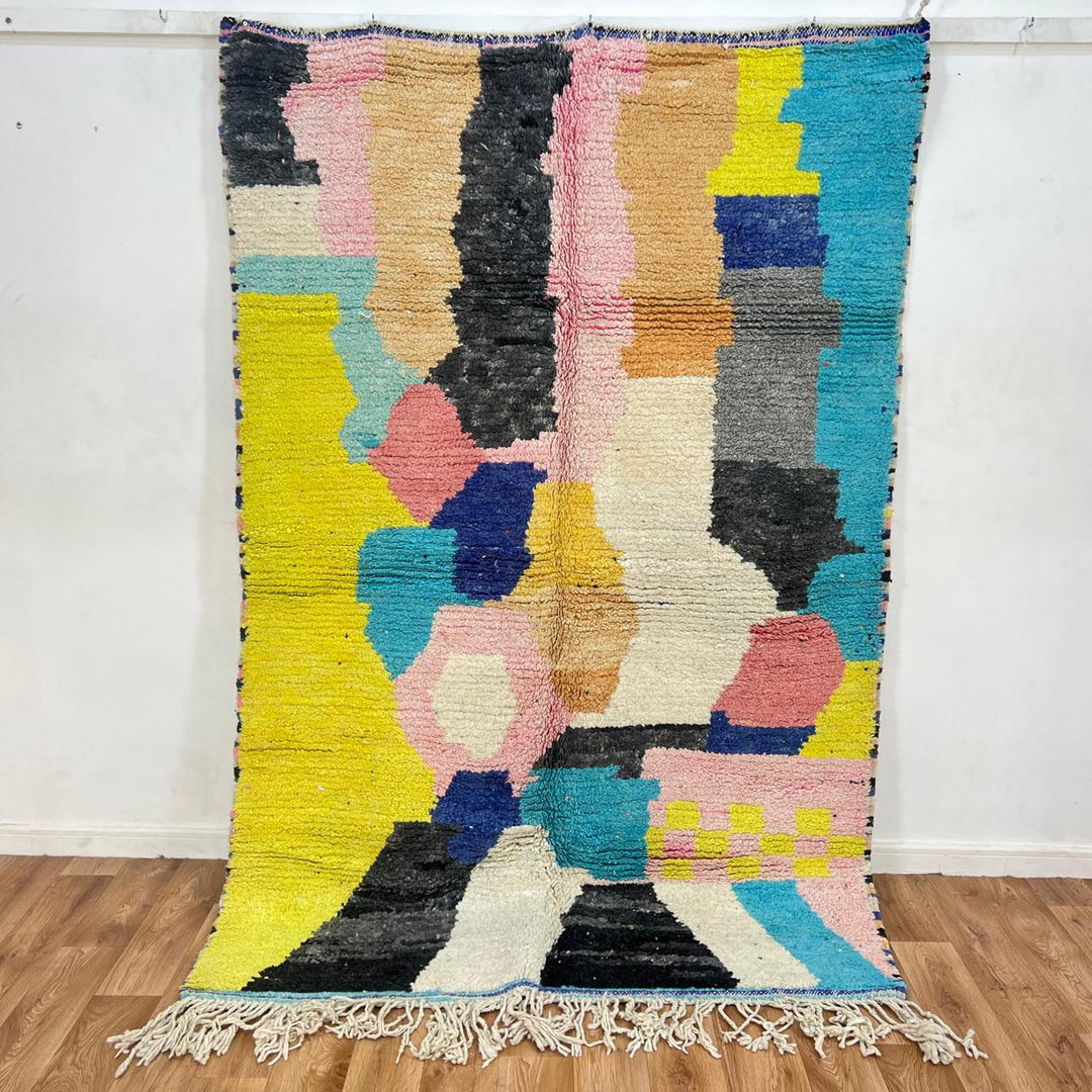 Vintage Moroccan wool rug with colorful abstract geometric blocks in yellow, blue, pink, teal and black, handwoven Berber carpet 234x156 cm