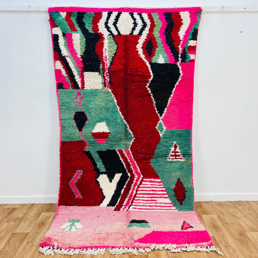 Vintage Moroccan wool rug with colorful abstract Berber patterns, handmade in Morocco