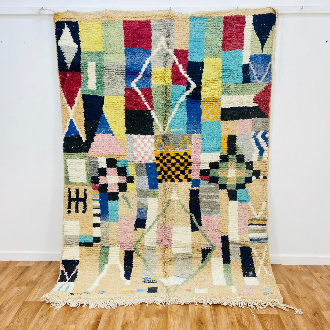 Vintage Moroccan wool rug with colorful patchwork Berber geometric design in pastel tones, handmade in Morocco