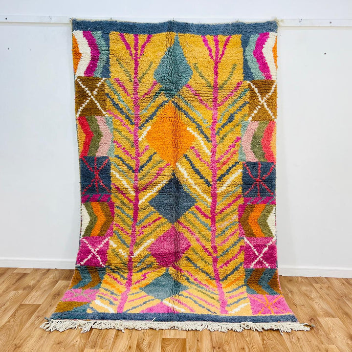 Vintage Moroccan wool rug with colorful geometric Berber pattern, handmade in Morocco