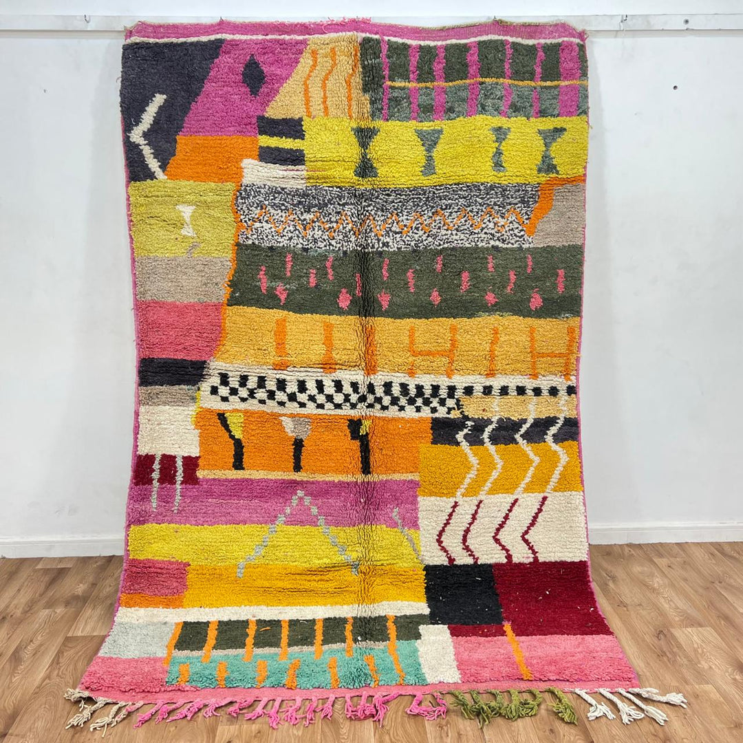 Vintage Moroccan wool rug with colorful geometric and tribal patterns, handmade Berber carpet in pink, mustard, green and ivory