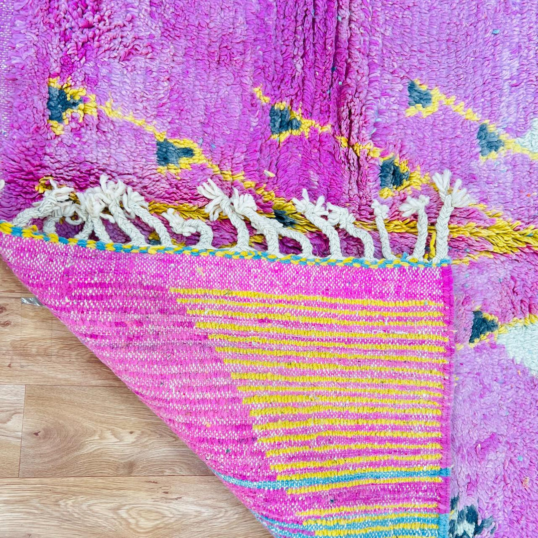 Vintage Moroccan wool rug with colorful Berber geometric and symbolic pattern, handmade in Morocco