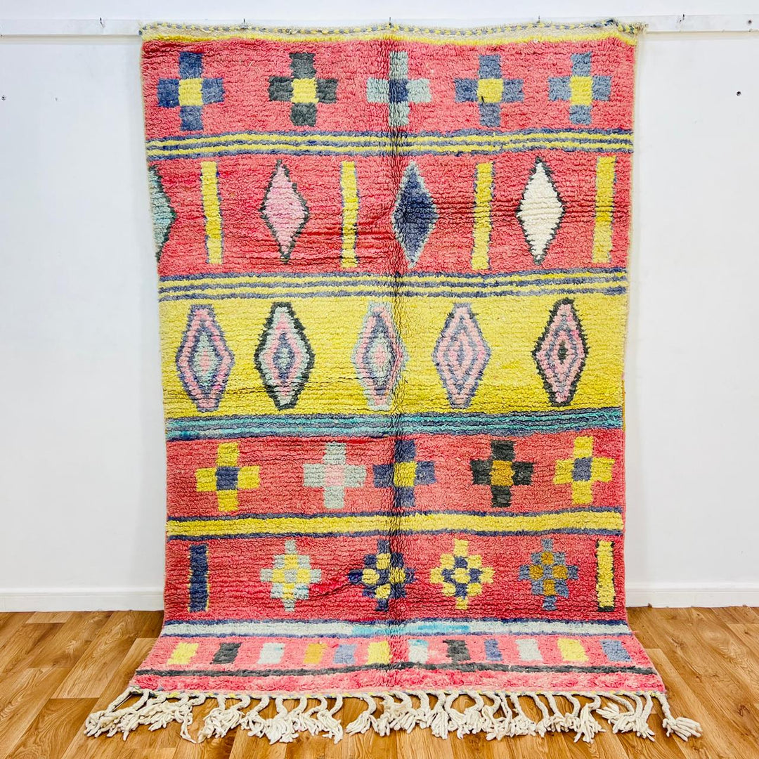 Vintage Moroccan wool rug with colorful Berber geometric patterns, handmade in Morocco
