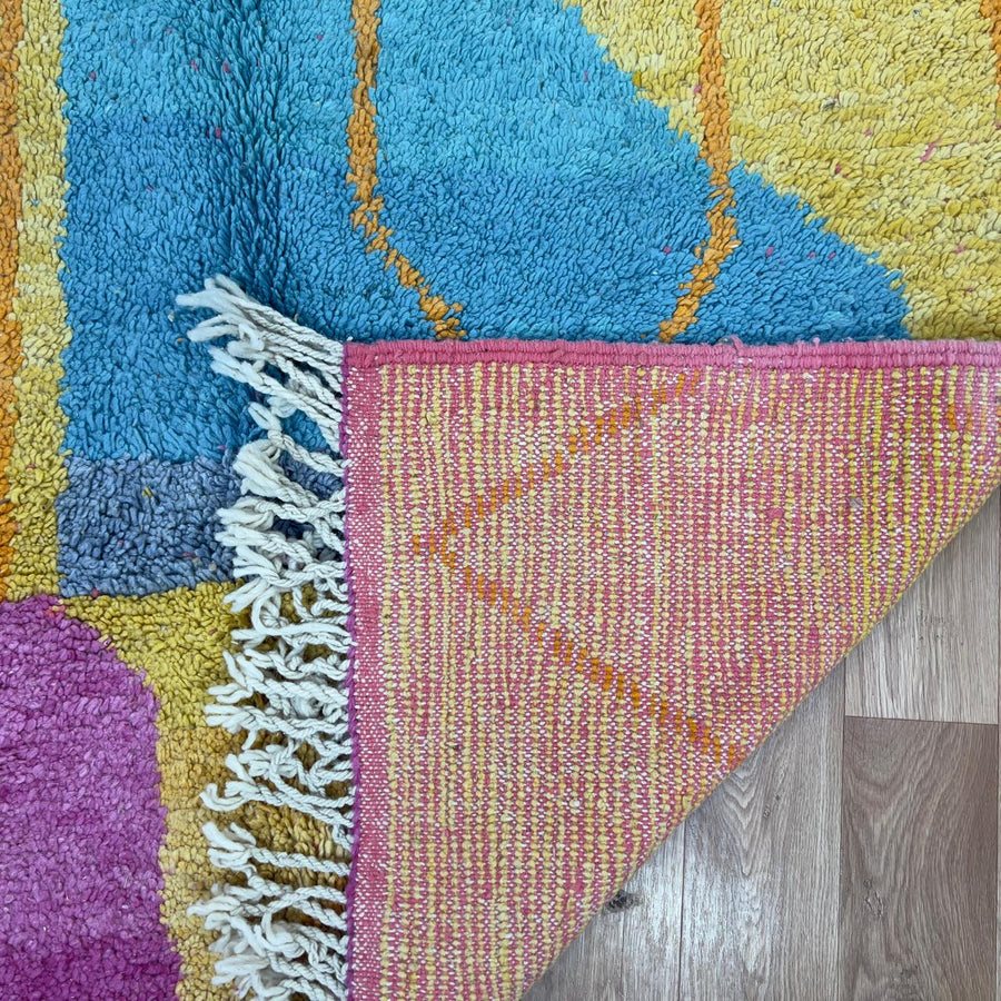 Vintage Moroccan wool rug 7.35x5.41 ft, handmade Berber shag rug with abstract geometric design in mustard yellow, pink and turquoise tones