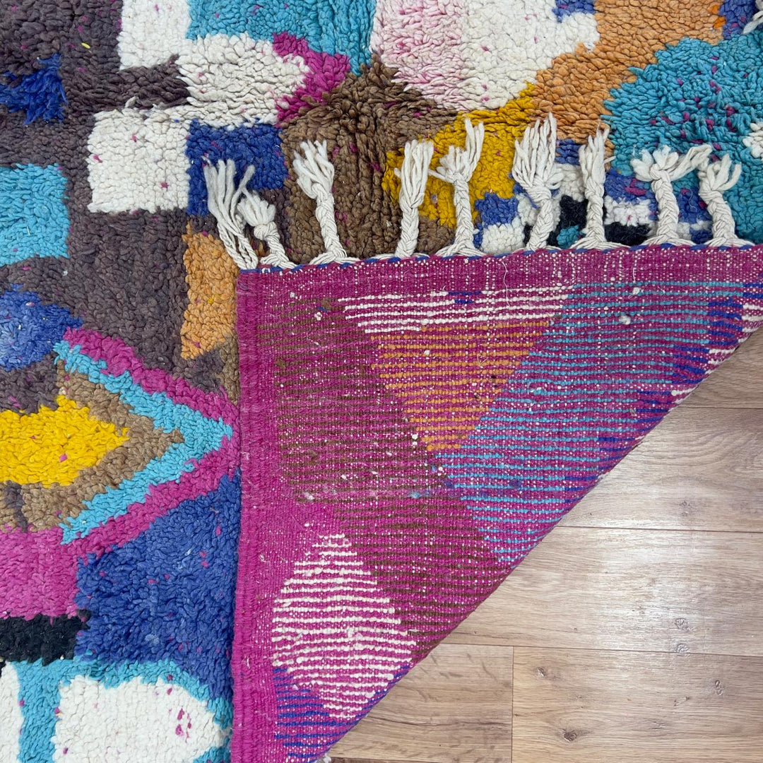 Vintage Moroccan wool rug 8.53x5.68 ft, handmade Berber shag carpet with colorful geometric tribal patterns in brown, pink, blue and mustard tones
