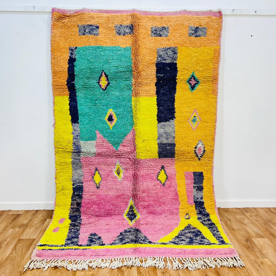 Vintage Moroccan wool rug with colorful geometric Berber pattern, handmade in Morocco