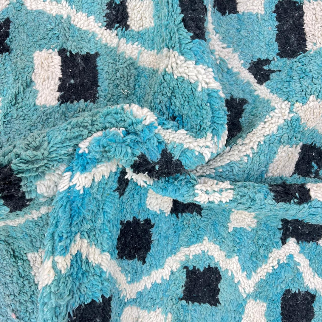 Vintage Moroccan wool rug in turquoise blue with black and ivory Berber geometric patterns
