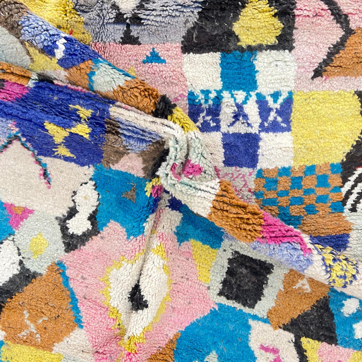 Vintage Moroccan wool rug with colorful patchwork geometric patterns in blue, pink, yellow and ivory, handwoven Berber rug 248x156 cm