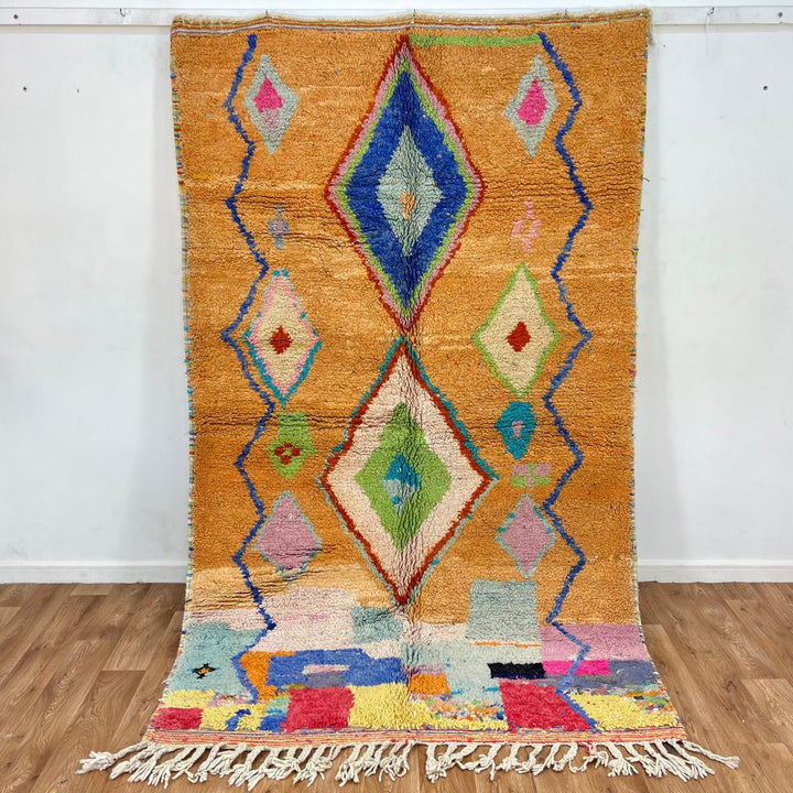 Vintage Moroccan wool rug with colorful Berber diamond patterns, handmade geometric area rug