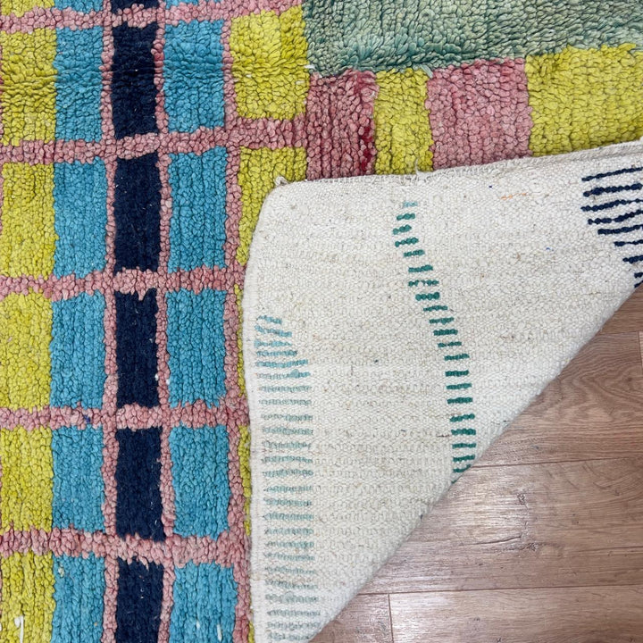 Vintage Moroccan wool rug 8.53x5.68 ft, handmade Berber shag carpet with colorful geometric tribal patterns in brown, pink, blue and mustard tones