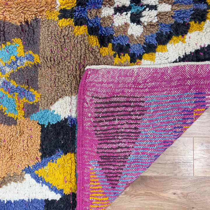 Vintage Moroccan wool rug 8.53x5.68 ft, handmade Berber shag carpet with colorful geometric tribal patterns in brown, pink, blue and mustard tones