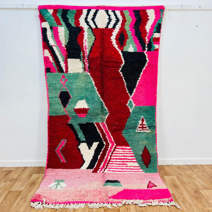 Vintage Moroccan wool rug with colorful abstract Berber patterns, handmade in Morocco
