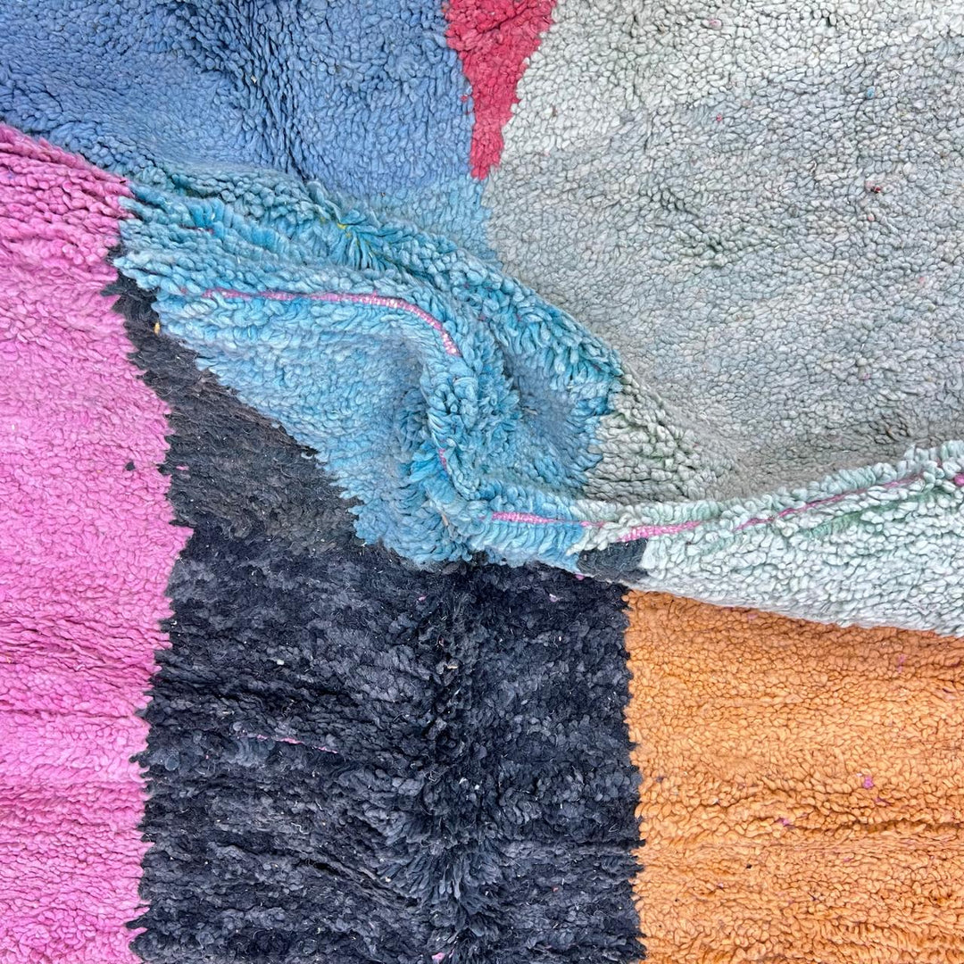 Vintage Moroccan Wool Rug 132 – handmade pink, yellow, and blue abstract Moroccan wool rug (255 × 150 cm).