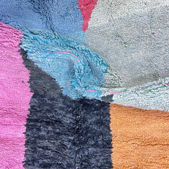 Vintage Moroccan Wool Rug 132 – handmade pink, yellow, and blue abstract Moroccan wool rug (255 × 150 cm).