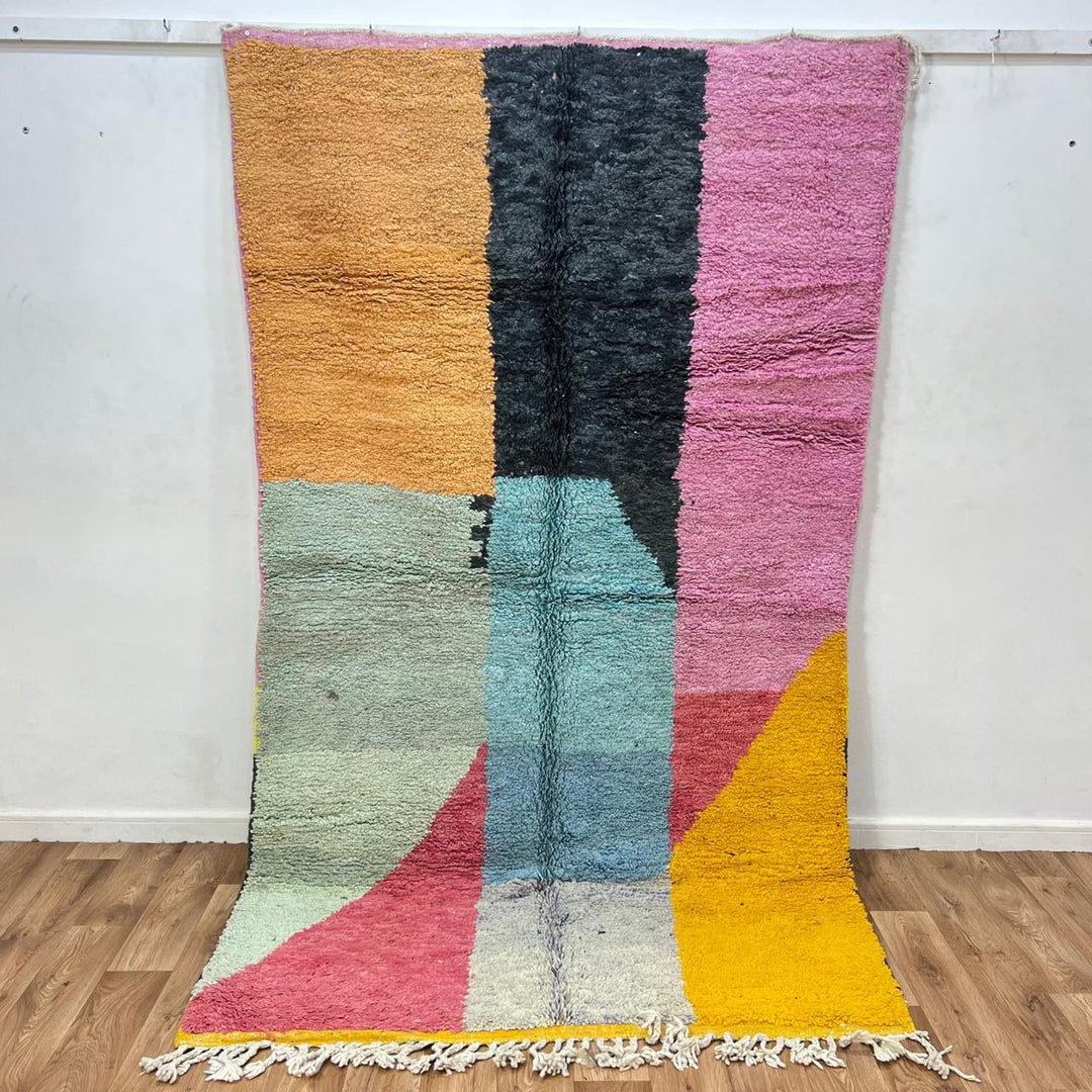 Vintage Moroccan Wool Rug 132 – handmade pink, yellow, and blue abstract Moroccan wool rug (255 × 150 cm).