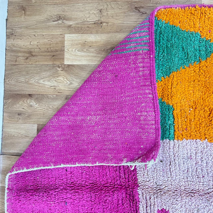 Vintage Moroccan Wool Rug 244 – handmade pink and orange geometric Moroccan wool rug (270 × 155 cm).