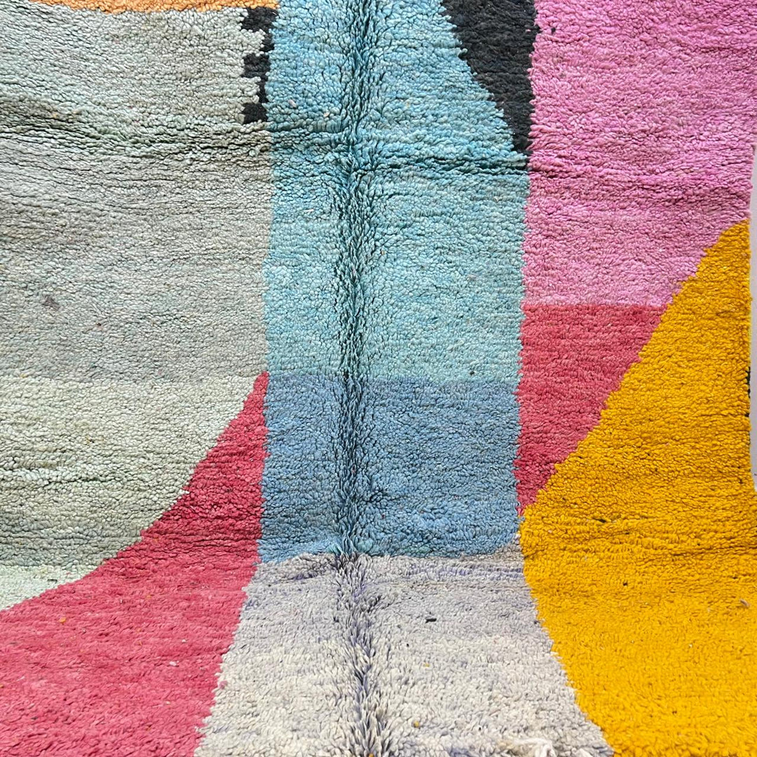 Vintage Moroccan Wool Rug 132 – handmade pink, yellow, and blue abstract Moroccan wool rug (255 × 150 cm).