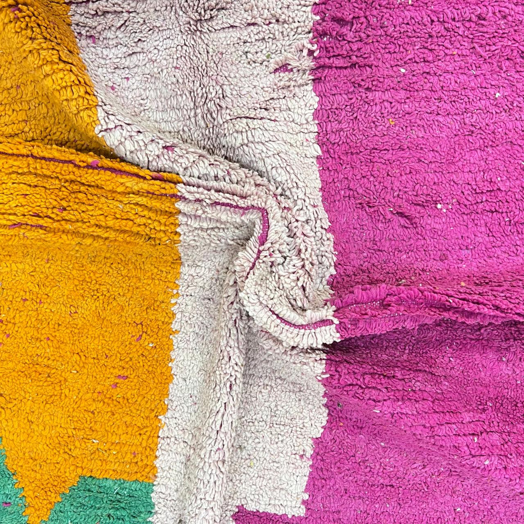 Vintage Moroccan Wool Rug 244 – handmade pink and orange geometric Moroccan wool rug (270 × 155 cm).