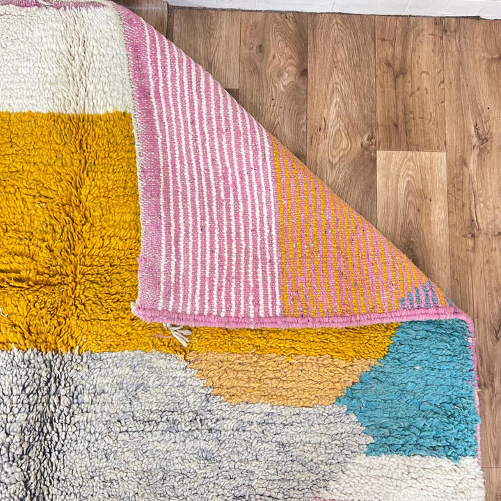 Vintage Moroccan Wool Rug 248 – handmade pastel abstract Moroccan wool rug with pink, mustard, and mint tones (250 × 155 cm).