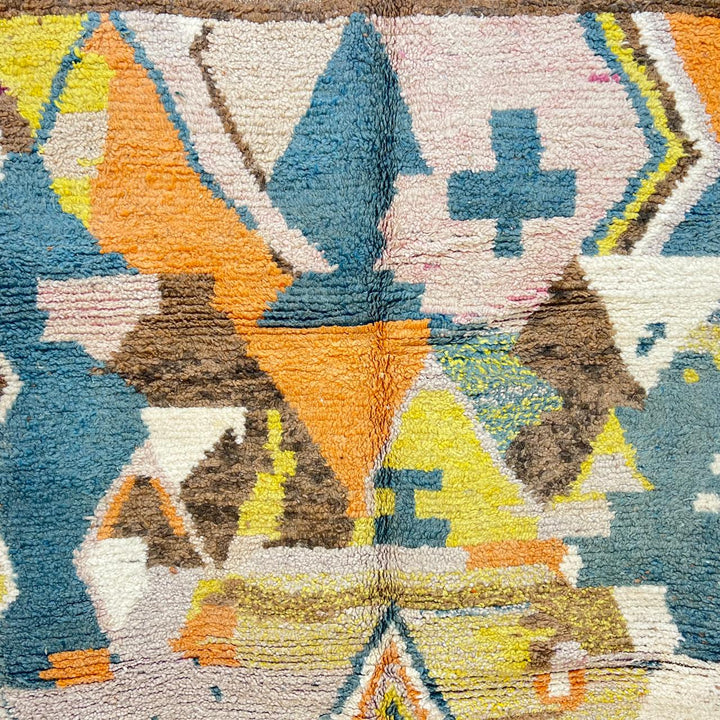 Vintage Moroccan Wool Rug 217 – handmade tribal geometric wool rug in blue, mustard, and orange tones (247 × 153 cm).