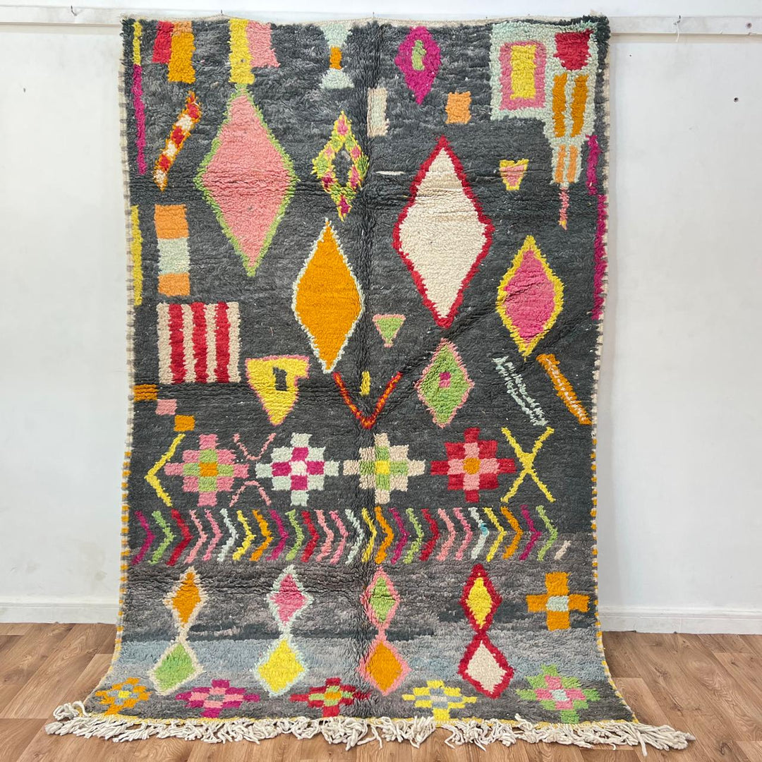 Vintage Moroccan wool rug with colorful Berber geometric pattern on gray background, handmade in Morocco, size 228 x 155 cm.