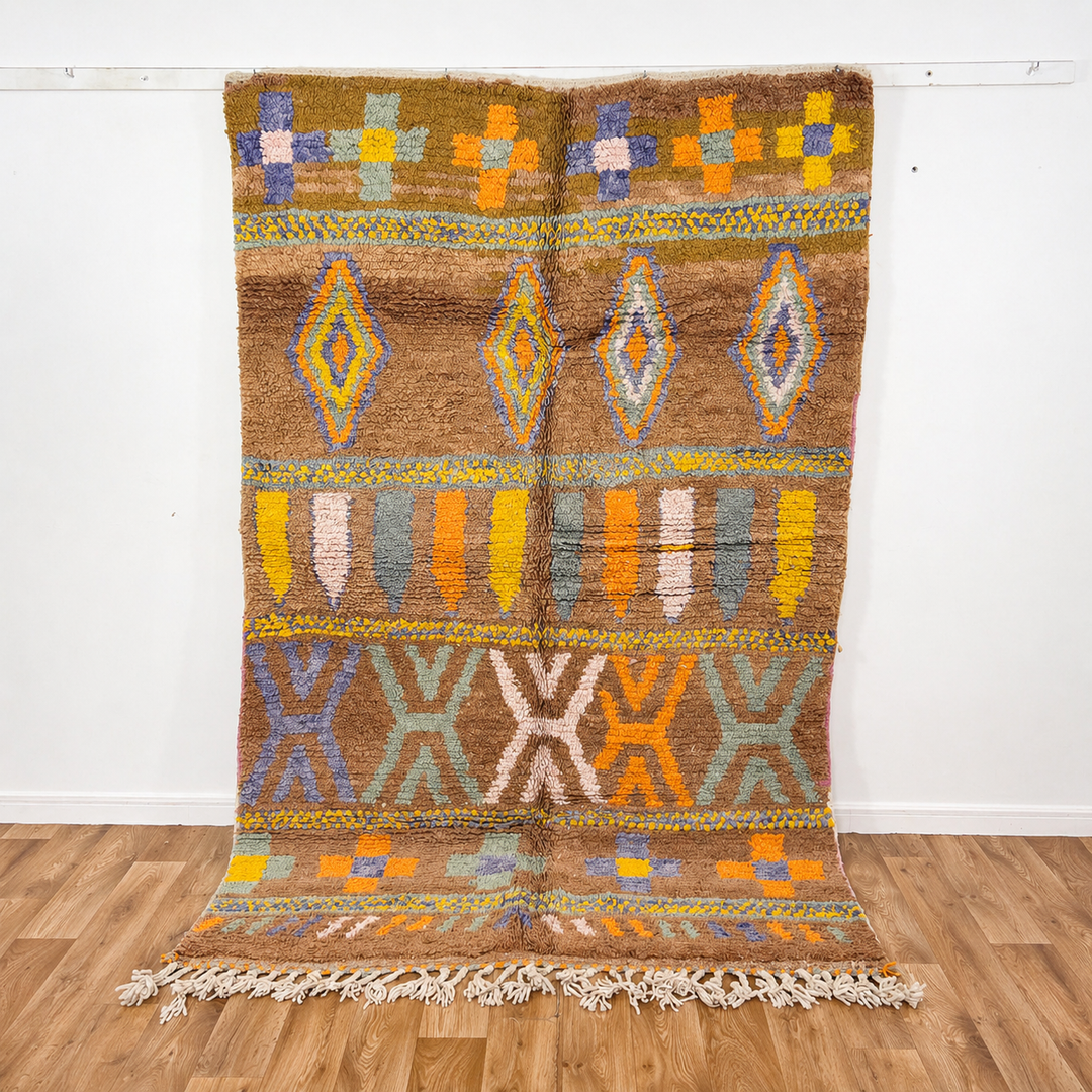 Vintage Moroccan wool rug with colorful Berber geometric patterns on brown background, handmade tribal carpet 8x5 ft