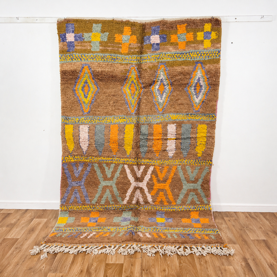 Vintage Moroccan wool rug with colorful Berber geometric patterns on brown background, handmade tribal carpet 8x5 ft