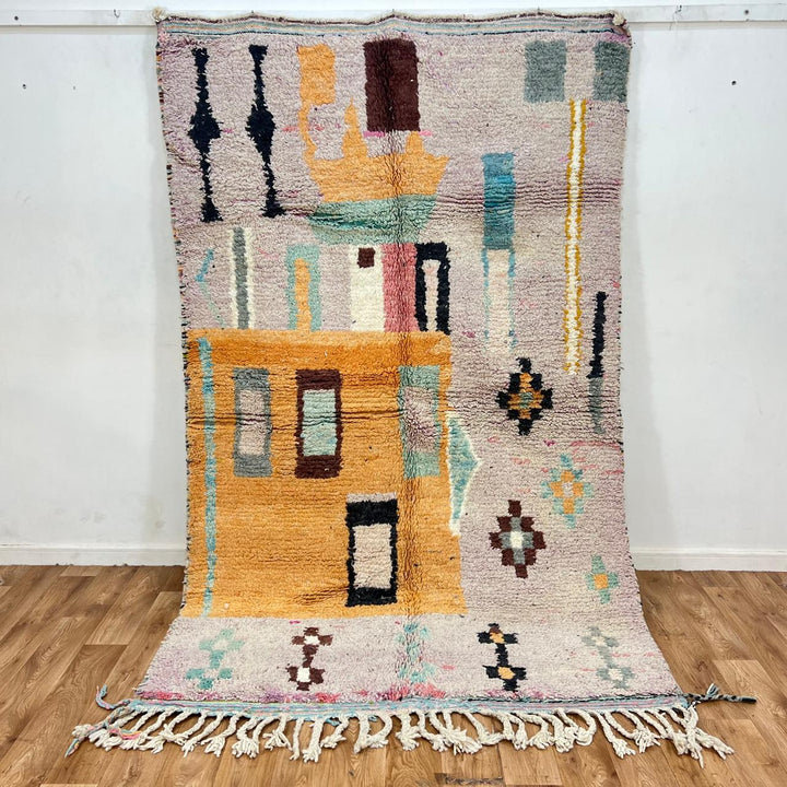Vintage Moroccan Berber rug with architectural abstract geometric design in ochre and pink wool