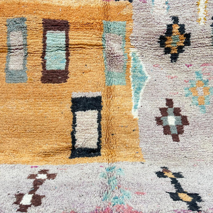 Vintage Moroccan Berber rug with architectural abstract geometric design in ochre and pink wool