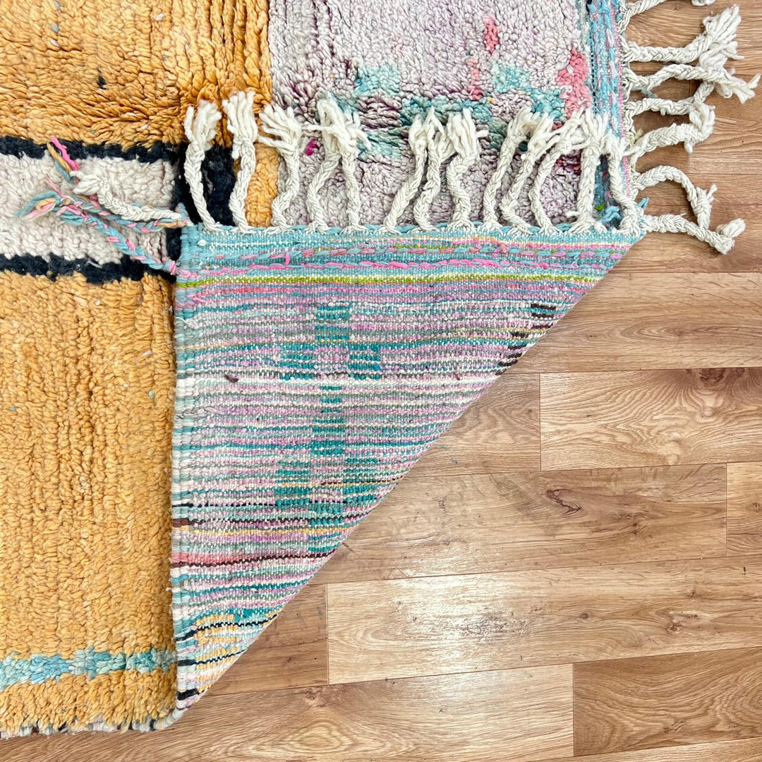 Vintage Moroccan Berber rug with architectural abstract geometric design in ochre and pink wool