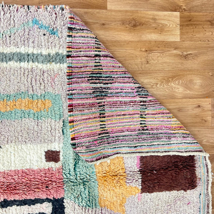 Vintage Moroccan Berber rug with architectural abstract geometric design in ochre and pink wool