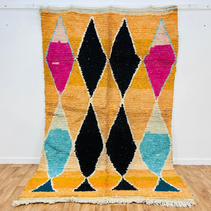 Vintage Moroccan wool rug 725 handmade Berber with bold black and colorful diamond patterns.