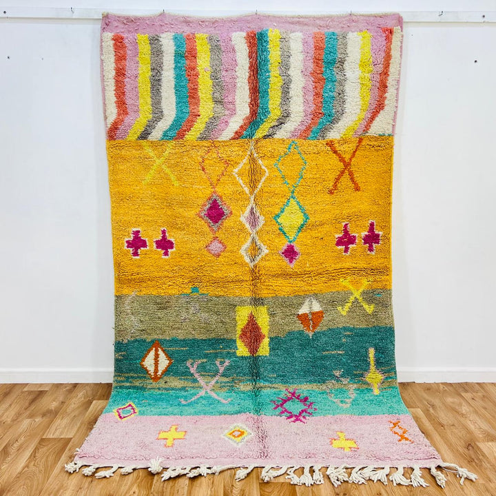Colorful vintage Moroccan wool rug 685 handmade Berber carpet with yellow, pink, and turquoise geometric design.