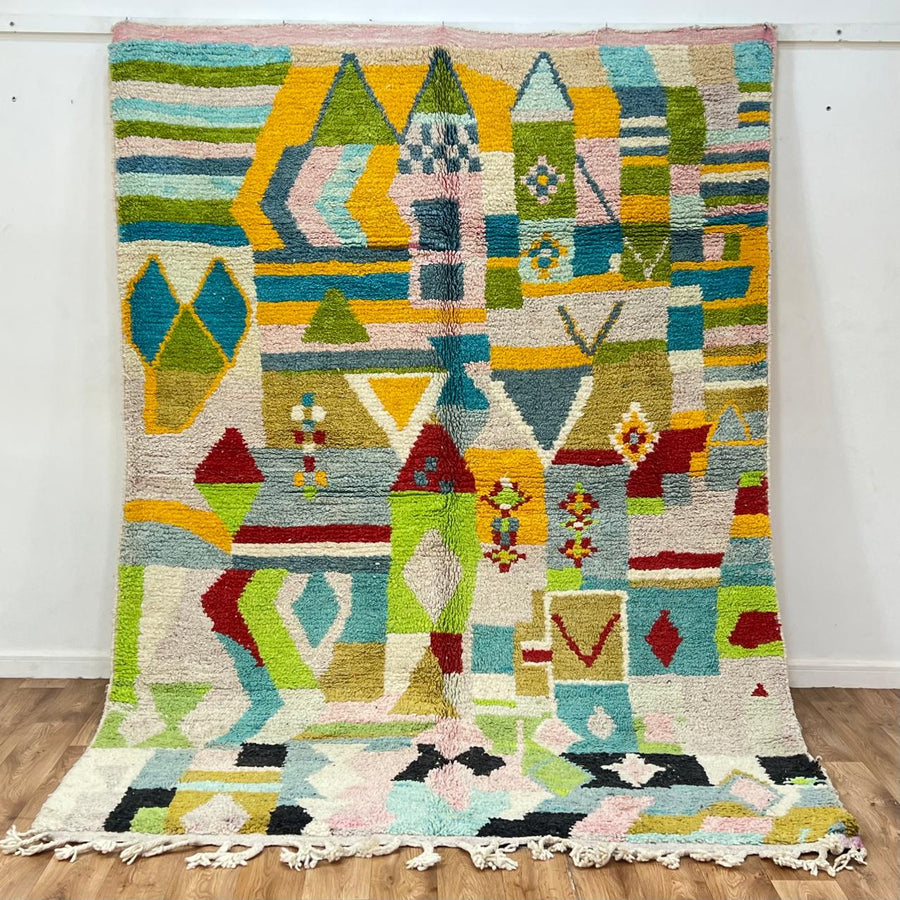 Vintage Moroccan wool rug 881 – handmade Berber carpet with colorful geometric pattern in red, green, turquoise, and mustard. 275 × 192 cm (9.02 × 6.29 ft).